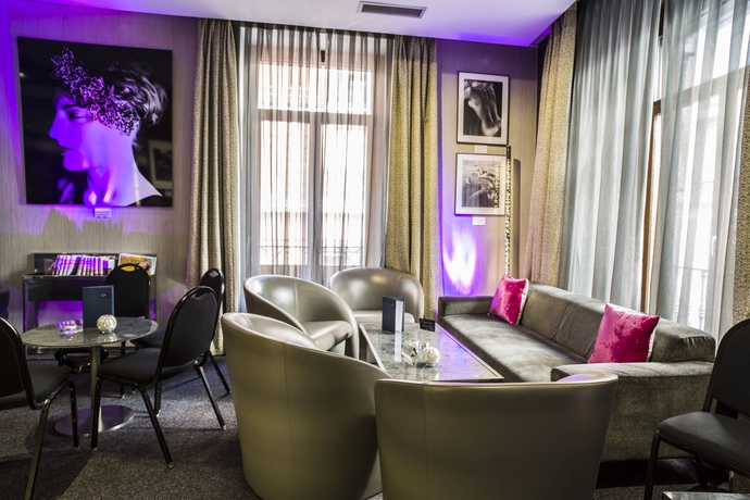 Imagen del bar/restaurante del Hotel Ac Recoletos By Marriott. Foto 2