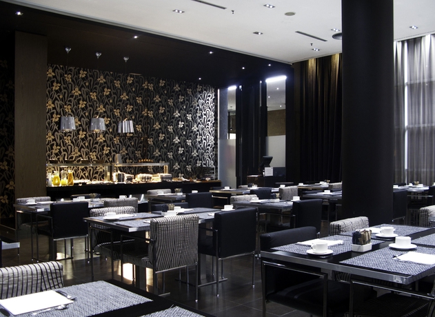 Imagen del bar/restaurante del Hotel Ac Som By Marriott. Foto 3