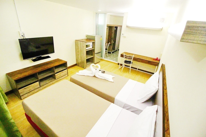 Imagen de la habitación del Hotel Ac Sport Village. Foto 10