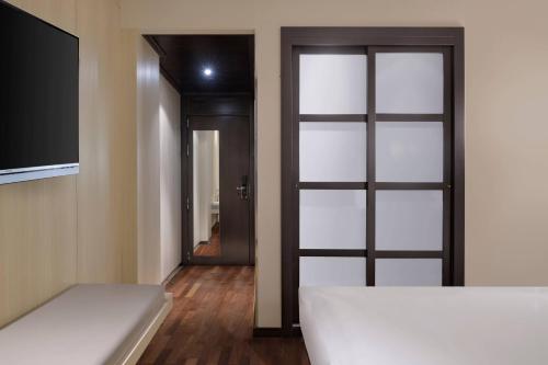 Imagen de la habitación del Hotel Ac Valencia By Marriott. Foto 10