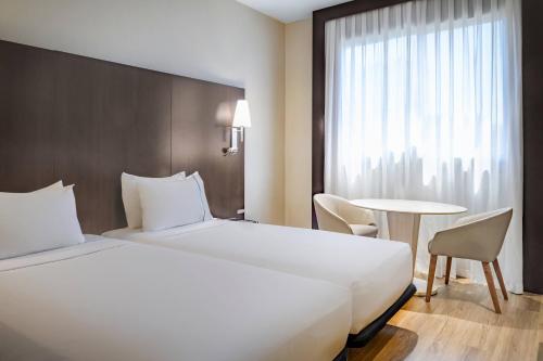 Imagen de la habitación del Hotel Ac Valencia By Marriott. Foto 13