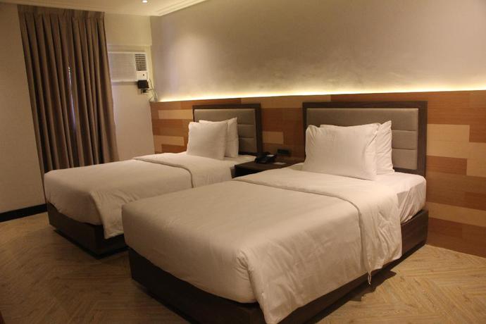 Imagen de la habitación del Hotel Acacia Bacolod. Foto 6