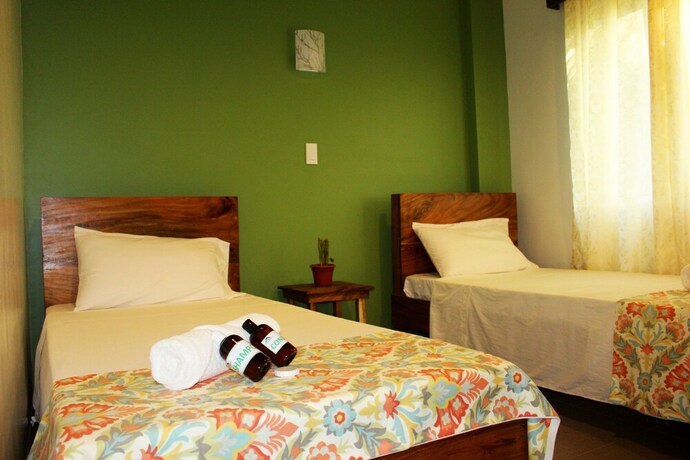 Imagen de la habitación del Hotel Acacia Garden Inn. Foto 25