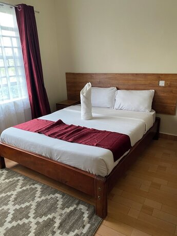 Imagen de la habitación del Hotel Acacia Gardens Gilgil. Foto 13