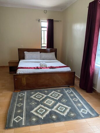 Imagen de la habitación del Hotel Acacia Gardens Gilgil. Foto 15
