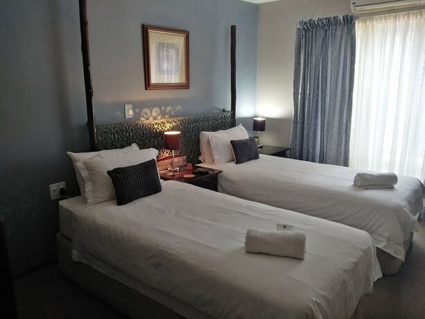 Imagen de la habitación del Hotel Acacia Guesthouse, Mbombela. Foto 19