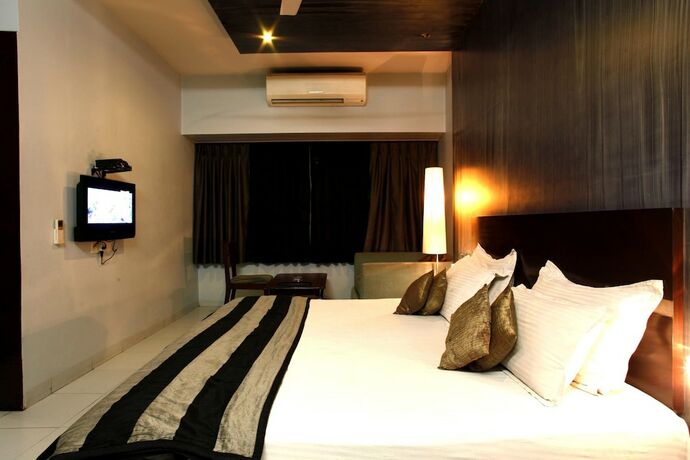 Imagen de la habitación del Hotel Acacia Inn. Foto 19