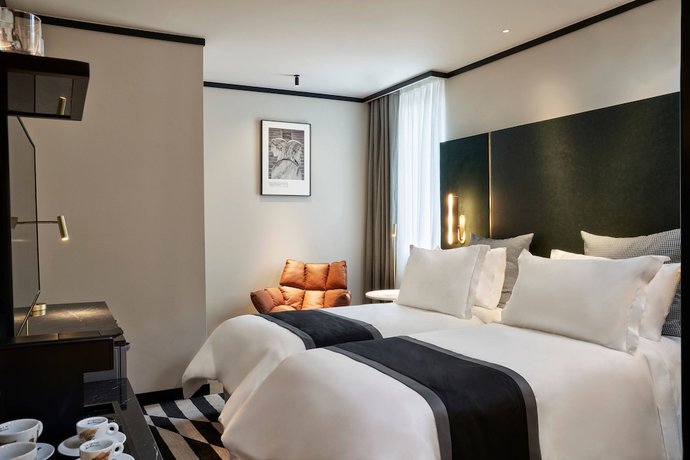 Imagen de la habitación del Hotel Academias , Autograph Collection. Foto 4