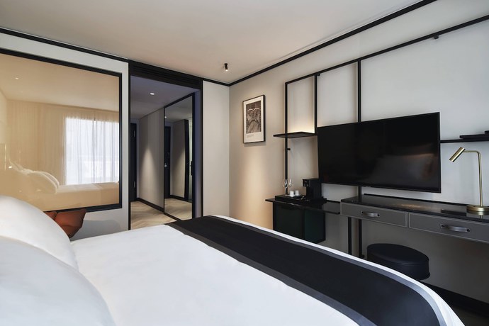 Imagen de la habitación del Hotel Academias , Autograph Collection. Foto 7