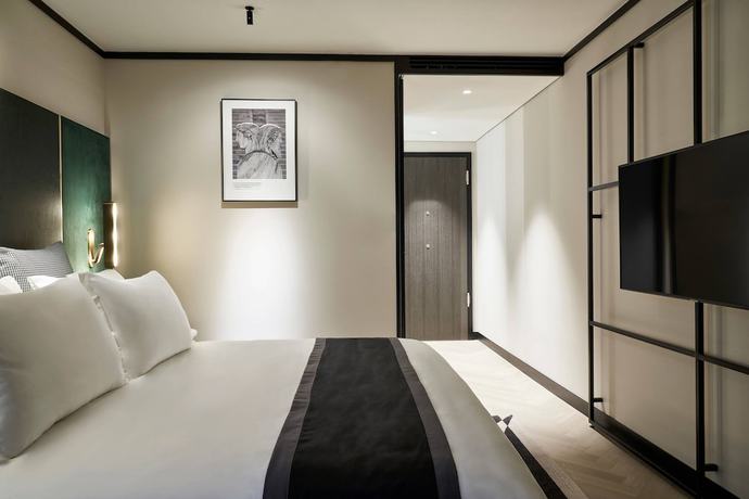 Imagen de la habitación del Hotel Academias , Autograph Collection. Foto 13