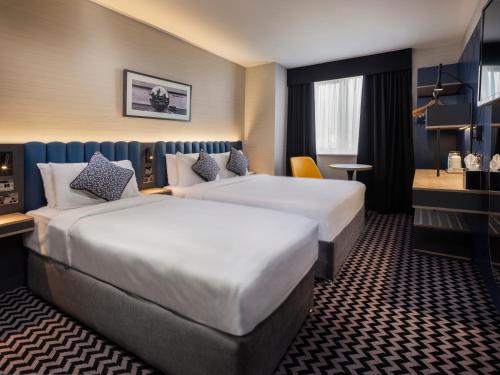 Imagen de la habitación del Hotel Academy Plaza. Foto 4