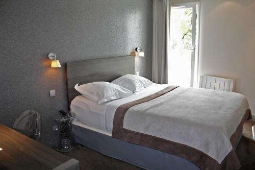 Imagen de la habitación del Hotel Acadie. Foto 6