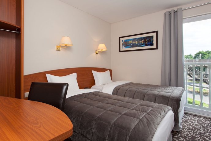 Imagen de la habitación del Hotel Acadie Villebon sur Yvette. Foto 12