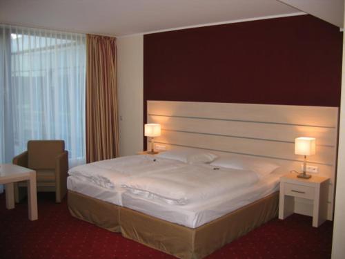 Imagen de la habitación del Hotel AcarA das Penthouse. Foto 7