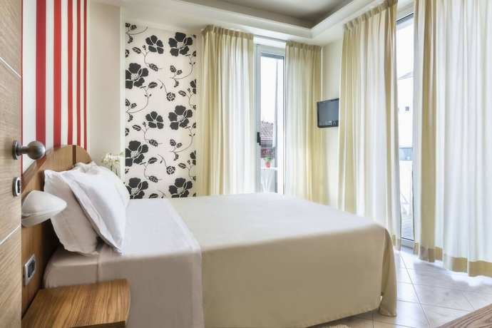 Imagen de la habitación del Hotel Acasamia Welchome. Foto 3