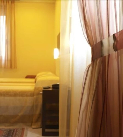 Imagen de la habitación del Hotel Acasamia Welchome. Foto 14