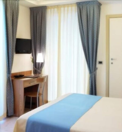 Imagen de la habitación del Hotel Acasamia Welchome. Foto 15