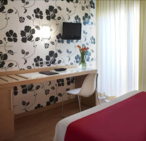 Imagen de la habitación del Hotel Acasamia Welchome. Foto 17