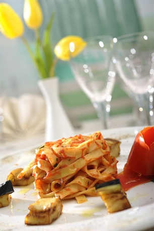 Imagen del bar/restaurante del Hotel Acca Sporting Milano. Foto 4