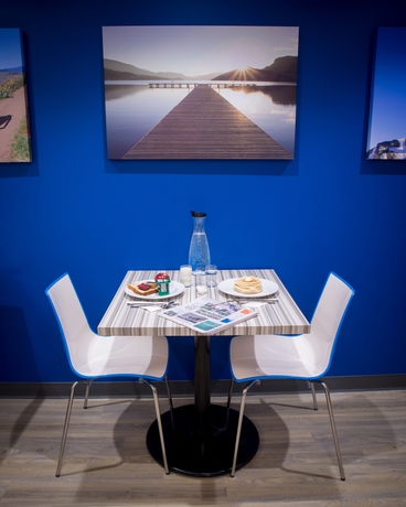 Imagen del bar/restaurante del Hotel Accent Inns Kelowna. Foto 2