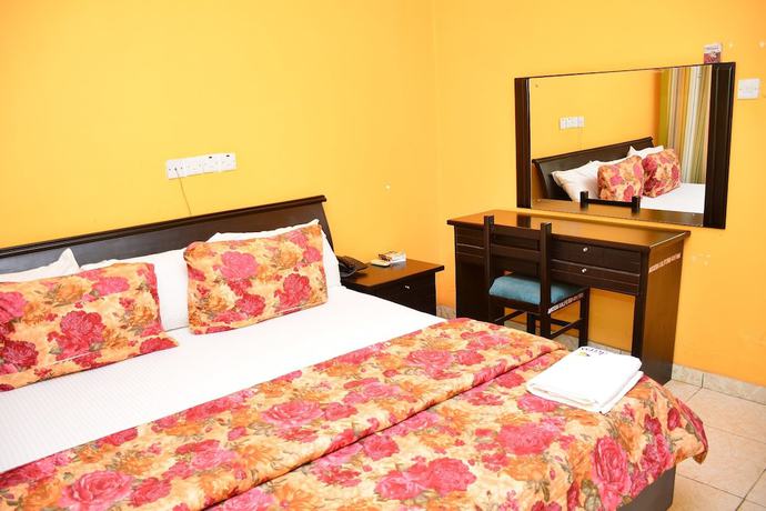 Imagen de la habitación del Hotel Access International. Foto 8