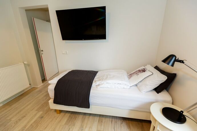 Imagen de la habitación del Hotel Acco Guesthouse. Foto 11