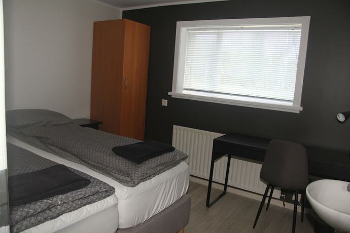 Imagen de la habitación del Hotel Acco Guesthouse. Foto 13