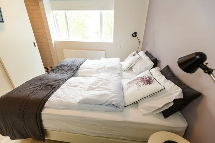 Imagen de la habitación del Hotel Acco Guesthouse. Foto 16