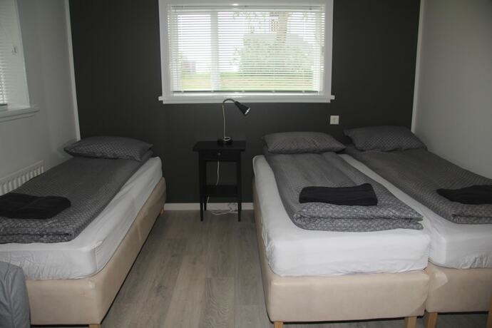 Imagen de la habitación del Hotel Acco Guesthouse. Foto 17