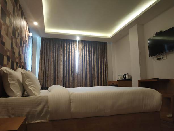 Imagen de la habitación del Hotel Accord. Foto 9