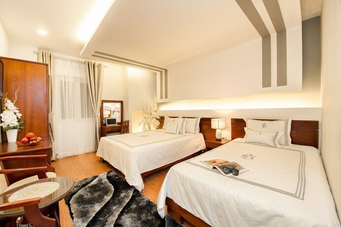Imagen de la habitación del Hotel Ace Ben Thanh. Foto 13
