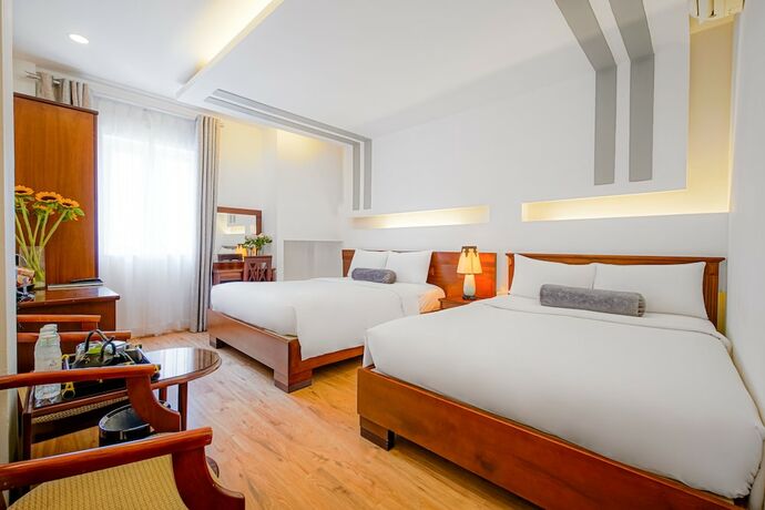Imagen de la habitación del Hotel Ace Ben Thanh. Foto 19
