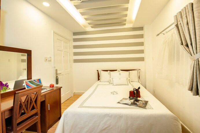 Imagen de la habitación del Hotel Ace Ben Thanh. Foto 20