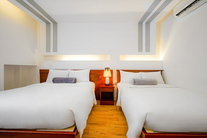 Imagen de la habitación del Hotel Ace Ben Thanh. Foto 21