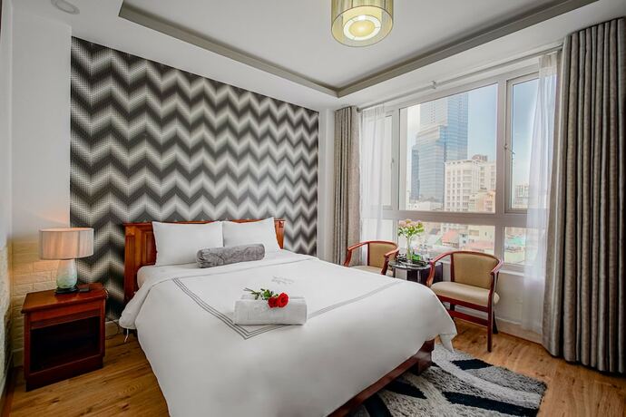 Imagen de la habitación del Hotel Ace Ben Thanh. Foto 26