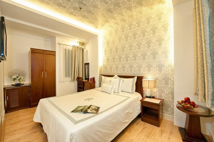 Imagen de la habitación del Hotel Ace Ben Thanh. Foto 30