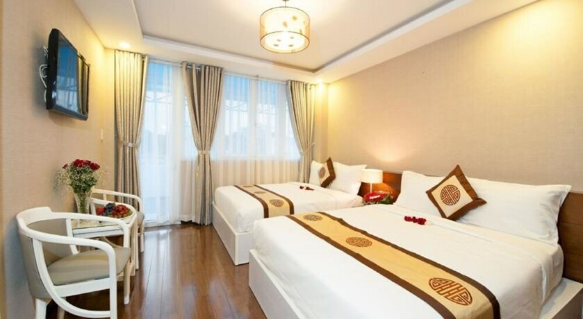 Imagen de la habitación del Hotel Ace Ben Thanh. Foto 36