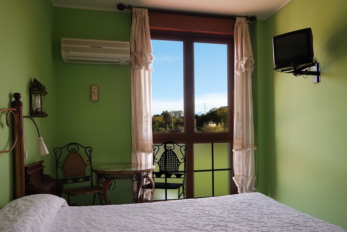 Imagen de la habitación del Hotel Acebos Arriondas. Foto 10