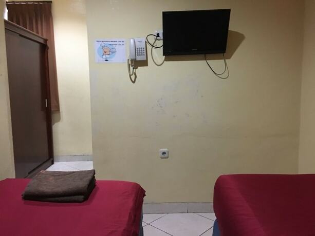 Imagen de la habitación del Hotel Aceh Besar. Foto 18