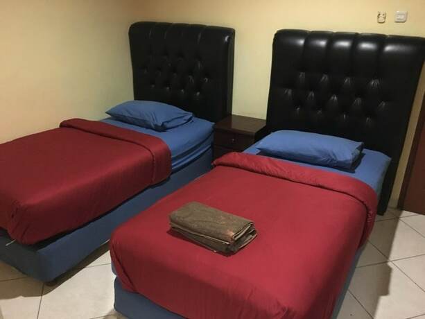 Imagen de la habitación del Hotel Aceh Besar. Foto 19