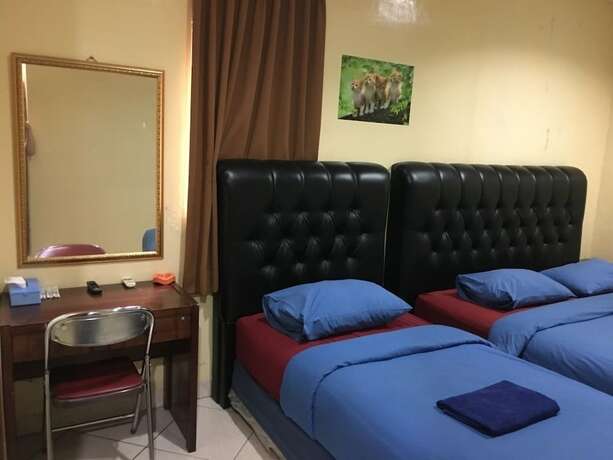 Imagen de la habitación del Hotel Aceh Besar. Foto 22