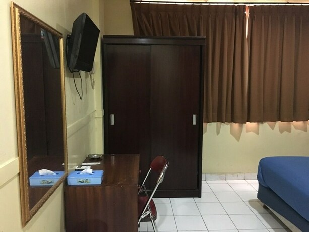 Imagen de la habitación del Hotel Aceh Besar. Foto 24