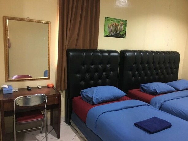 Imagen de la habitación del Hotel Aceh Besar. Foto 30