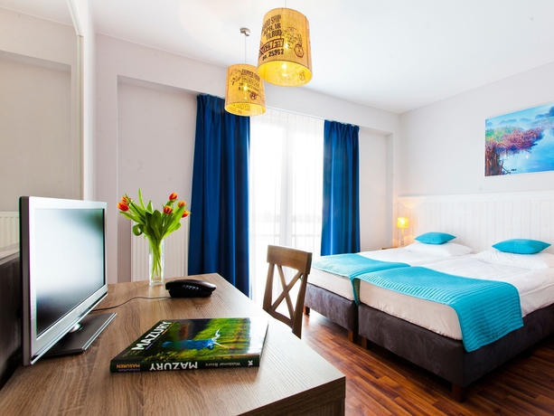 Imagen de la habitación del Hotel Ach Mazury. Foto 5