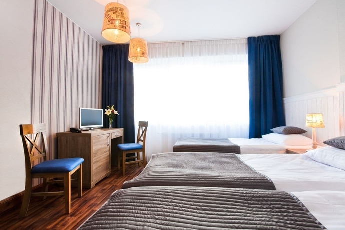 Imagen de la habitación del Hotel Ach Mazury. Foto 6