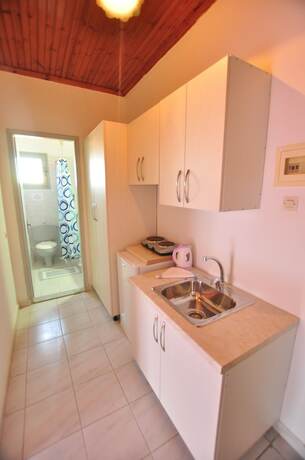 Imagen de la habitación del Hotel Acharavi Garden. Foto 15