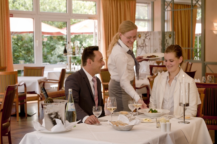 Imagen del bar/restaurante del Hotel Achat Reilingen Walldorf. Foto 7