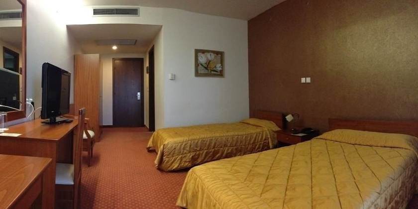 Imagen de la habitación del Hotel Achillio. Foto 18