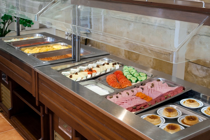 Imagen del bar/restaurante del Hotel Achillion Palace. Foto 3