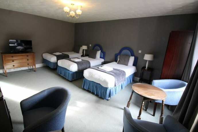 Imagen de la habitación del Hotel Achilty Guest House. Foto 13